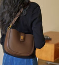 Fashion Drawstring Bucket Bag – Soft Leather Crossbody with Plush Charm